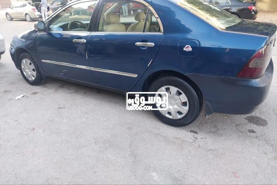للبيع سيارة تويوتا كورولا زرقة رخصة سارية بالمعادى