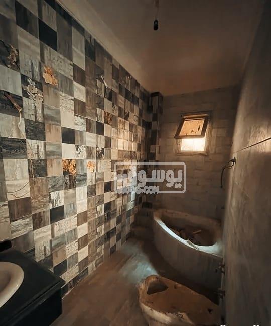 منزل للبيع تشطيب كامل دورين من غير عمولات بحدايق اكتوبر