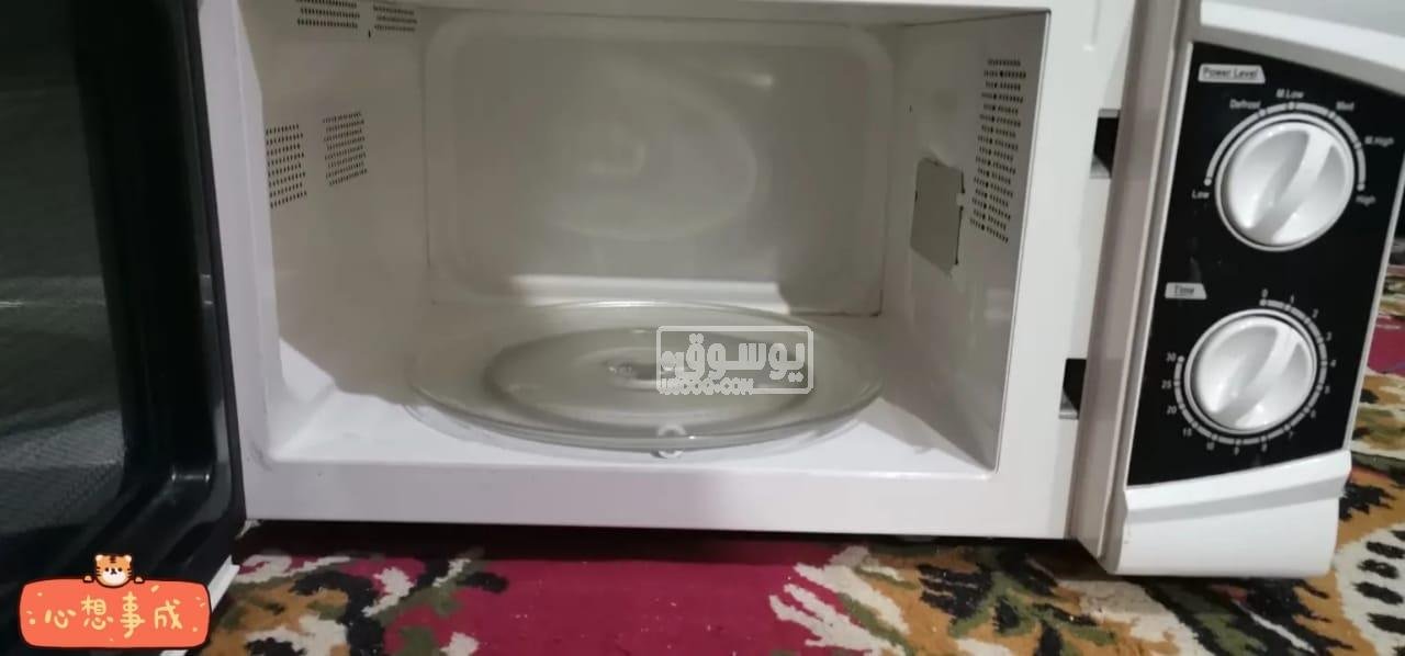 ميكروويف للبيع استخدام خفيف حالتة فوق الممتازة فى فيصل