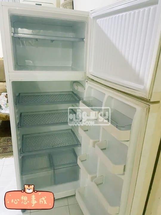 تلاجة للبيع اتنين باب كريازى بحالة ممتازة البيع لدواعى السفر