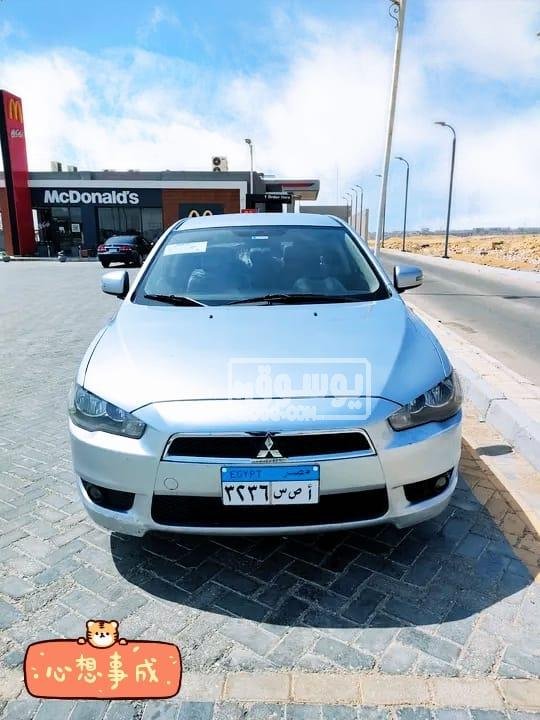 سيارة للبيع ميتسوبيشى موديل 2016 عداد 81 الف كم بالقاهرة