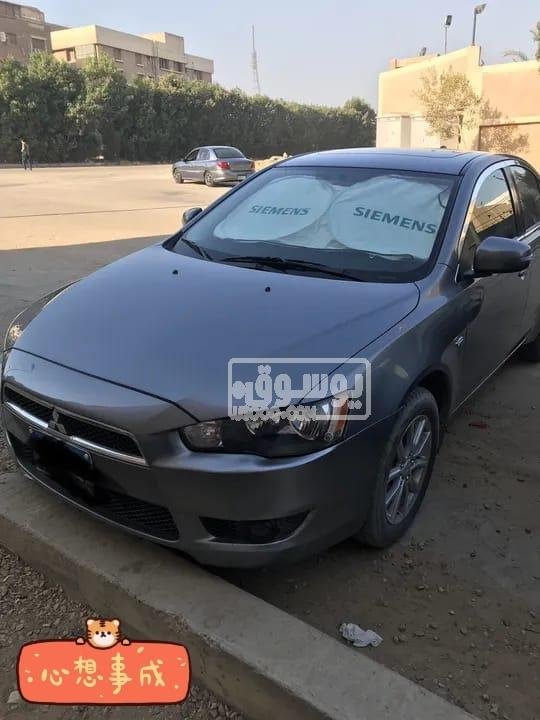 سيارة ميتسوبيشى لانسر اوتوماتيك فبريكا عدا اكصدام امامى
