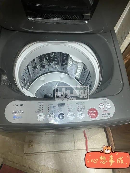 غسالة للبيع مستعملة بحالة ممتازة توشيبا البيع بسبب السفر