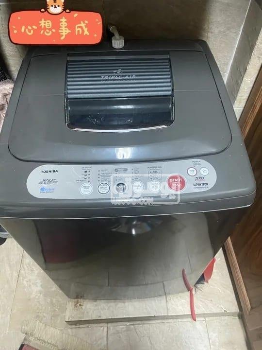 غسالة للبيع مستعملة بحالة ممتازة توشيبا البيع بسبب السفر