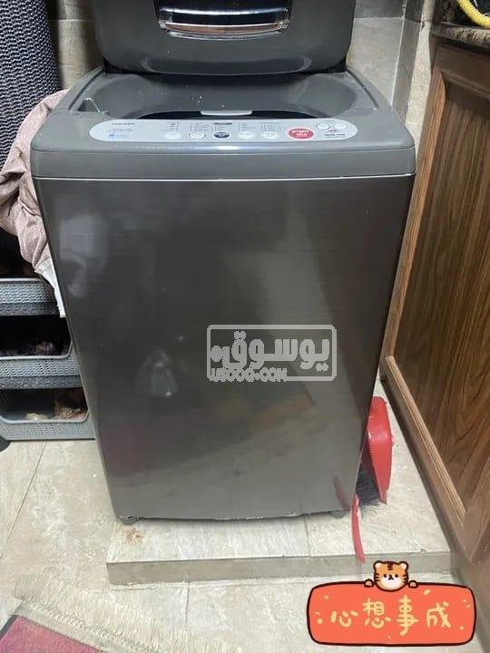 غسالة للبيع مستعملة بحالة ممتازة توشيبا البيع بسبب السفر